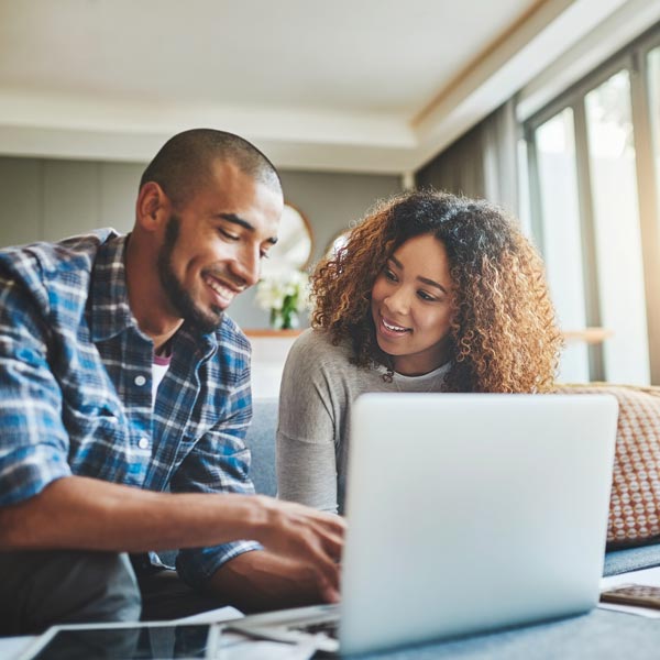 couple using laptop